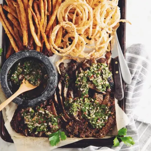 Grilled Portobello Steaks with Chimichurri and Onion Strings